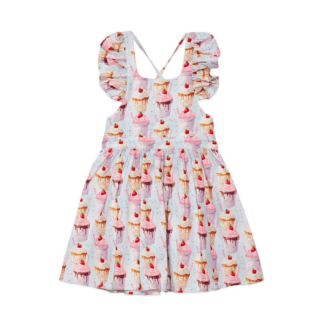 Girls birthday dress with ruffle sleeves and strappy back featuring milkshakes