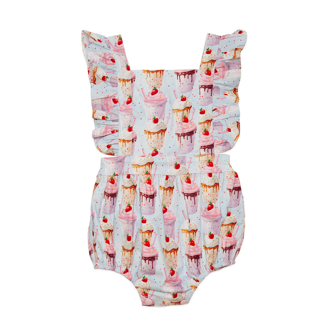 Baby bubble romper in birthday print featuring milkshakes